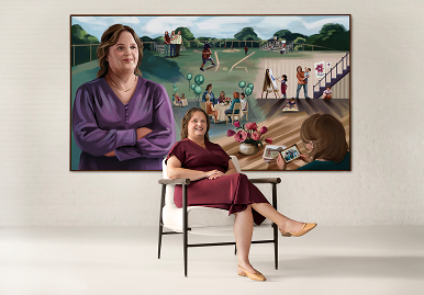 Jennifer sitting in front of a mural of her life