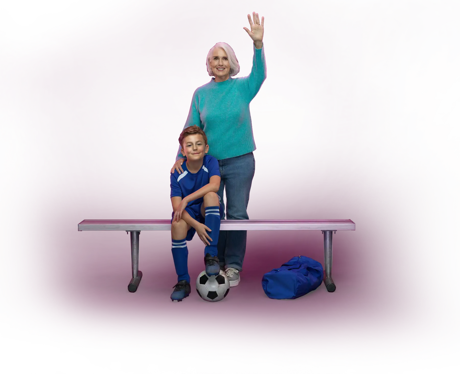 A woman standing with an arm raised and her grandson